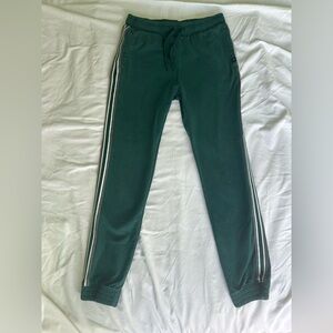Green Track Pants with White Stripes